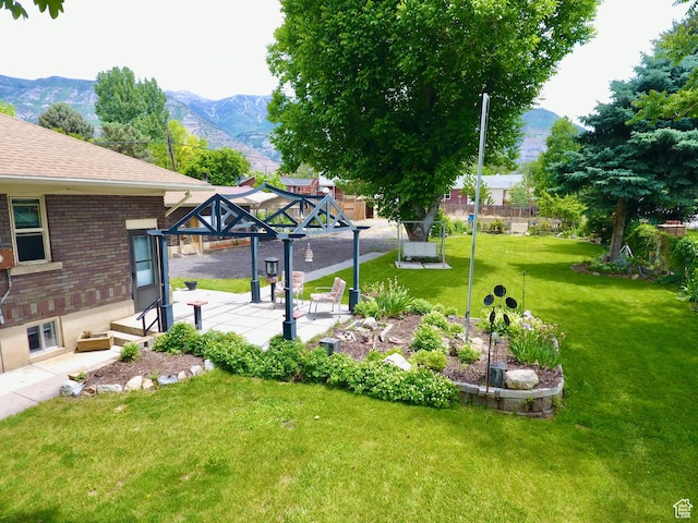 67 S 200 E, Pleasant Grove, UT 84062 - view of green lawn with a mountain view, a gazebo, and a patio