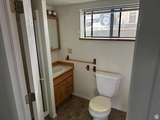 67 S 200 E, Pleasant Grove, UT 84062 - bathroom with vanity, toilet, and baseboards