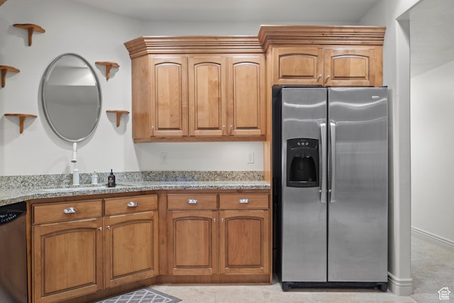 503 W 650 S, Orem, UT 84058 - kitchen with stainless steel appliances, light stone counters, brown cabinets, and a sink