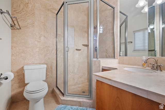 503 W 650 S, Orem, UT 84058 - full bath featuring a shower stall, vanity, toilet, and tile walls