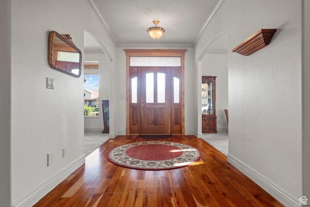 503 W 650 S, Orem, UT 84058 - foyer entrance with arched walkways, hardwood / wood-style floors, baseboards, and ornamental molding