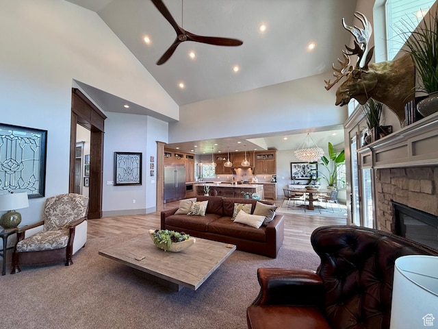 1820 S Kerrybrook Dr, Kaysville, UT 84037 - living room with high vaulted ceiling, ceiling fan, recessed lighting, plenty of natural light, and a fireplace