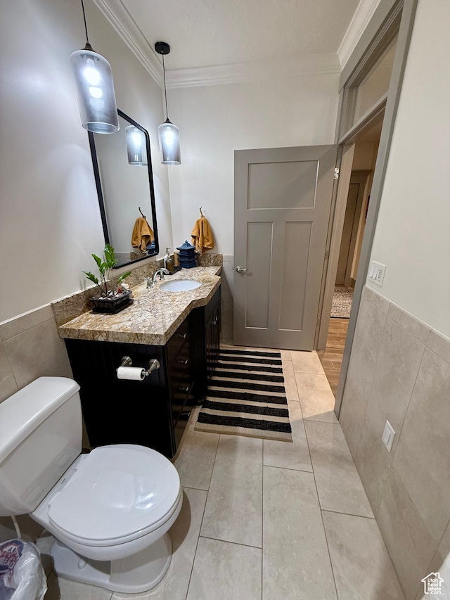 1820 S Kerrybrook Dr, Kaysville, UT 84037 - bathroom featuring ornamental molding, tile patterned floors, toilet, vanity, and tile walls