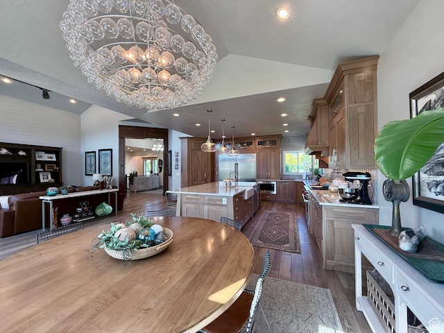 1820 S Kerrybrook Dr, Kaysville, UT 84037 - dining room with lofted ceiling, a chandelier, dark wood-style flooring, and recessed lighting