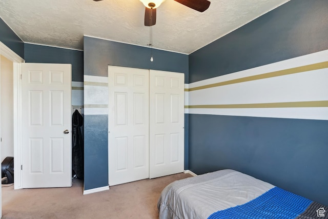 4293 W 5550 S, Roy, UT 84067 - bedroom with carpet, a closet, ceiling fan, baseboards, and a textured ceiling