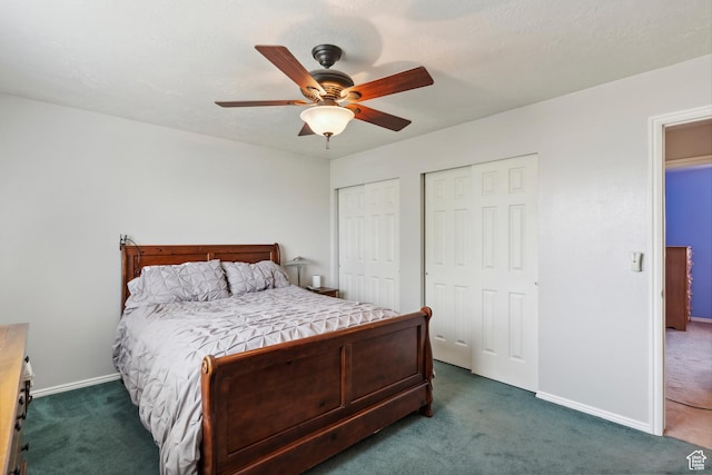4293 W 5550 S, Roy, UT 84067 - bedroom with dark colored carpet, two closets, and baseboards