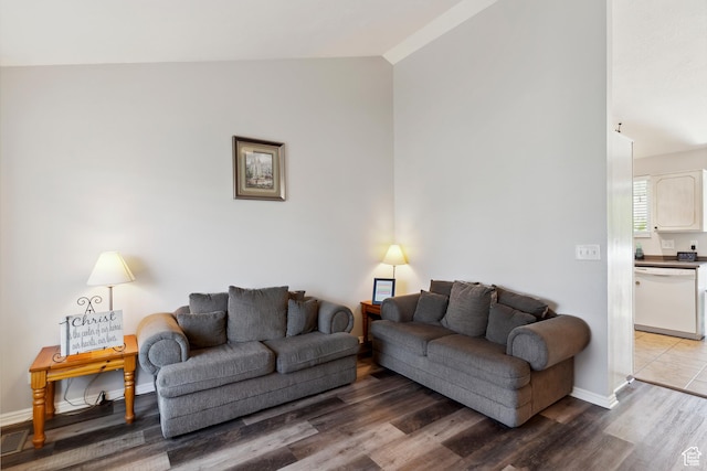4293 W 5550 S, Roy, UT 84067 - living area featuring lofted ceiling, wood finished floors, and baseboards