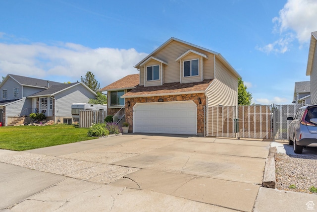 4293 W 5550 S, Roy, UT 84067 - traditional home featuring a gate, a garage, driveway, stone siding, and a residential view