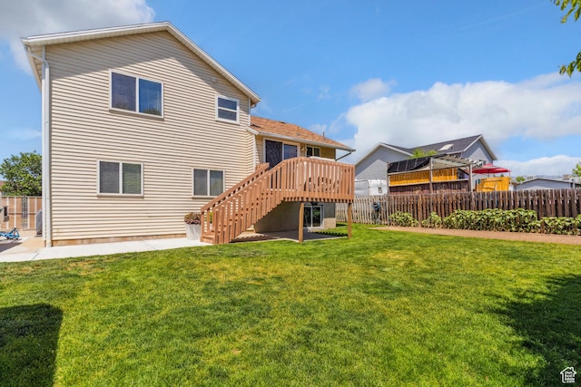 4293 W 5550 S, Roy, UT 84067 - rear view of house with stairs, a wooden deck, and a patio area