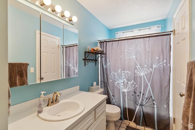 4293 W 5550 S, Roy, UT 84067 - bathroom featuring vanity, toilet, and tile patterned floors