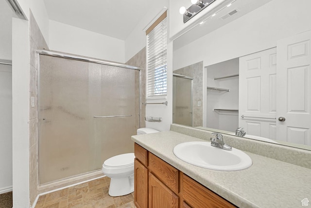 282 Caleb Dr, North Salt Lake, UT 84054 - full bath featuring a stall shower, vanity, toilet, and stone finish flooring