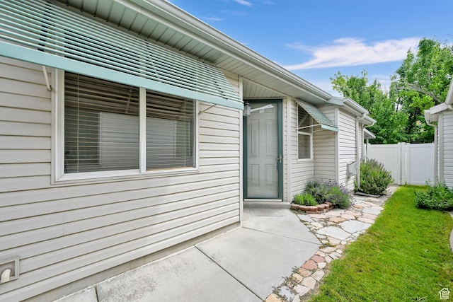 282 Caleb Dr, North Salt Lake, UT 84054 - view of exterior entry with a patio