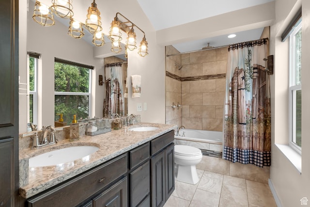 11316 E Silver Fork Rd, Brighton, UT 84121 - full bathroom with a combined bath / shower with rainfall shower, double vanity, toilet, a chandelier, and tile patterned flooring