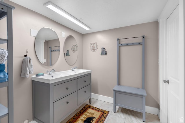 11316 E Silver Fork Rd, Brighton, UT 84121 - bathroom featuring double vanity and baseboards