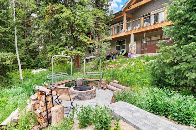 11316 E Silver Fork Rd, Brighton, UT 84121 - view of patio featuring a fire pit