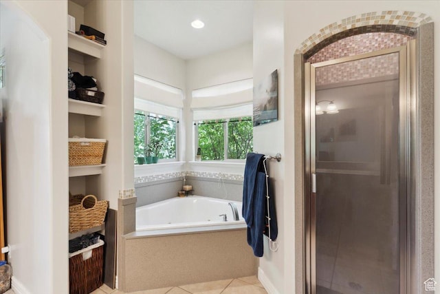 969 S View Crest Ln W, Kaysville, UT 84037 - bathroom with a jetted tub, a stall shower, tile patterned flooring, and built in shelves