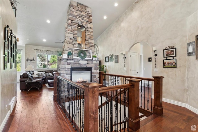 969 S View Crest Ln W, Kaysville, UT 84037 - staircase with arched walkways, wood finished floors, baseboards, and recessed lighting