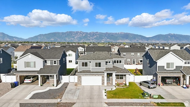 3287 S Boots Way, Syracuse, UT 84075 - traditional-style house with driveway, a residential view, a gate, and stone siding