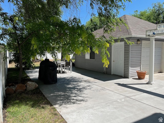 632 W 200 N, Salt Lake City, UT 84116 - view of patio / terrace featuring outdoor dining area and a garage