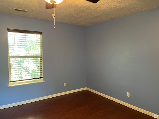 632 W 200 N, Salt Lake City, UT 84116 - spare room with a textured ceiling and dark wood finished floors