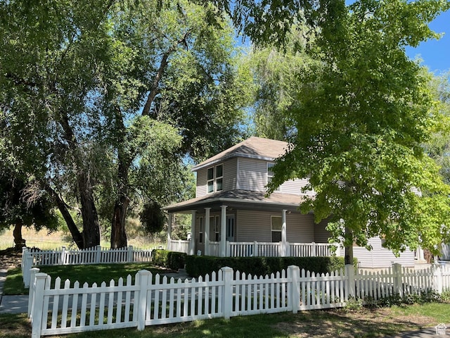 632 W 200 N, Salt Lake City, UT 84116 - farmhouse-style home with covered porch and a fenced front yard