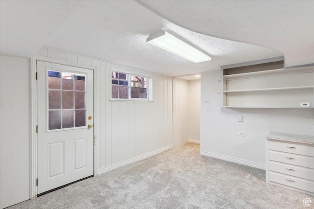 920 N 200 W, Bountiful, UT 84010 - basement featuring baseboards, carpet flooring, plenty of natural light, and a textured ceiling