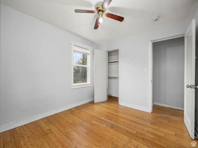 990 W 300 N, Provo, UT 84601 - unfurnished bedroom with a closet, baseboards, light wood finished floors, and ceiling fan