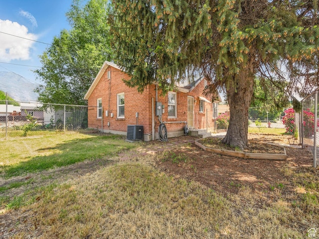 990 W 300 N, Provo, UT 84601 - view of side of property with brick siding and cooling unit