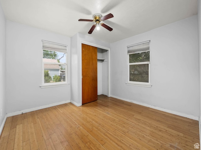 990 W 300 N, Provo, UT 84601 - unfurnished bedroom with a closet, light wood finished floors, baseboards, and ceiling fan