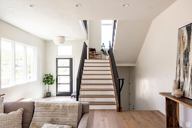4107 W Crest Ct, Park City, UT 84098 - stairs with wood finished floors and recessed lighting