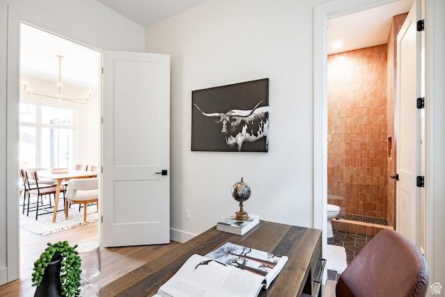 4107 W Crest Ct, Park City, UT 84098 - office area featuring wood finished floors, a chandelier, and baseboards