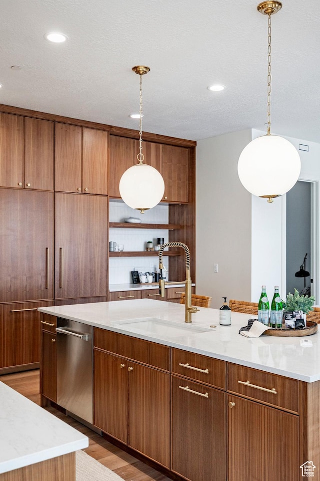 4107 W Crest Ct, Park City, UT 84098 - kitchen featuring stainless steel dishwasher, a sink, light wood finished floors, brown cabinets, and recessed lighting