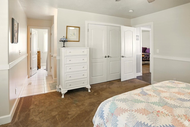 130 S 1500 W, Marriott Slaterville, UT 84404 - tiled bedroom with carpet flooring, baseboards, and a closet