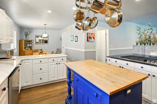 130 S 1500 W, Marriott Slaterville, UT 84404 - kitchen with butcher block counters, blue cabinetry, stainless steel appliances, white cabinetry, and recessed lighting