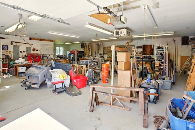 130 S 1500 W, Marriott Slaterville, UT 84404 - garage featuring a workshop area, a garage door opener, and electric panel