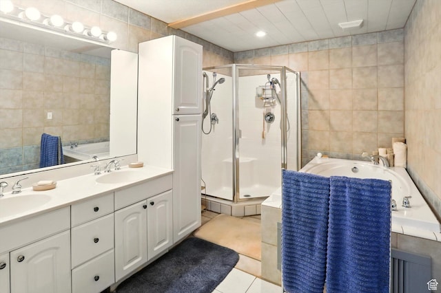 130 S 1500 W, Marriott Slaterville, UT 84404 - bathroom with tile walls, a stall shower, a bath, tile patterned flooring, and double vanity