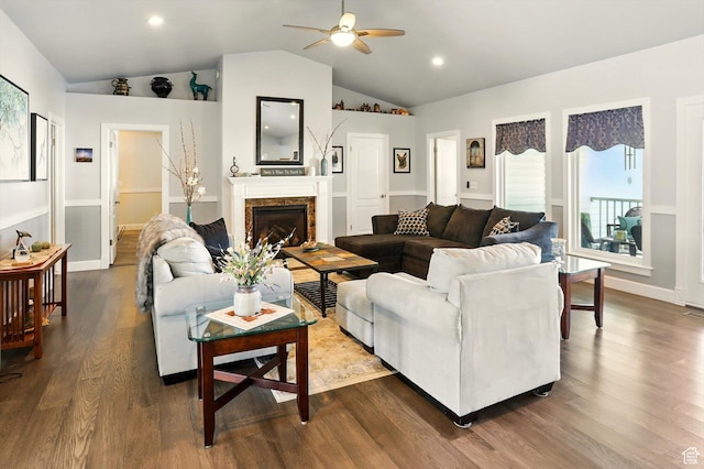 130 S 1500 W, Marriott Slaterville, UT 84404 - living room featuring a ceiling fan, lofted ceiling, dark wood-type flooring, a fireplace, and baseboards