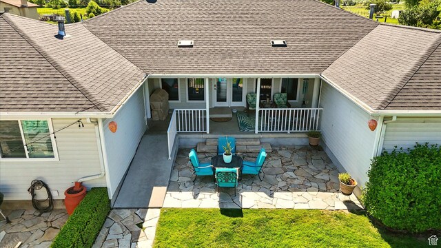 130 S 1500 W, Marriott Slaterville, UT 84404 - back of property featuring a patio area and a shingled roof