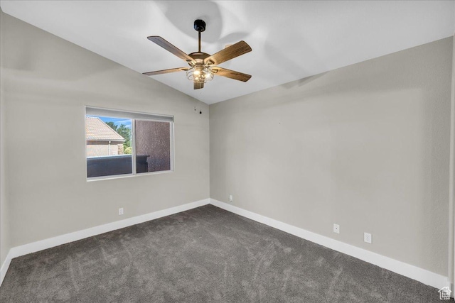 2461 W 1050 N, Hurricane, UT 84737 - empty room featuring a ceiling fan, vaulted ceiling, dark colored carpet, and baseboards