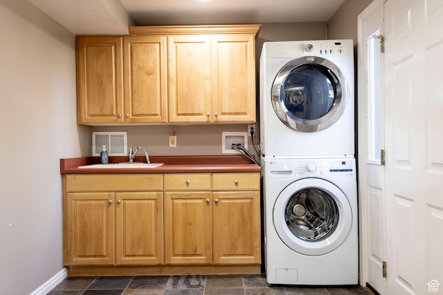 964 W Vahe St, Draper, UT 84020 - laundry area with stacked washer and clothes dryer, cabinet space, and baseboards