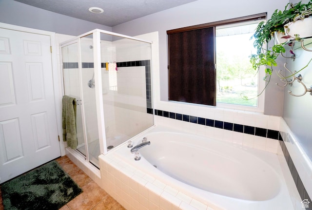 964 W Vahe St, Draper, UT 84020 - bathroom with a bath, a stall shower, and tile patterned floors