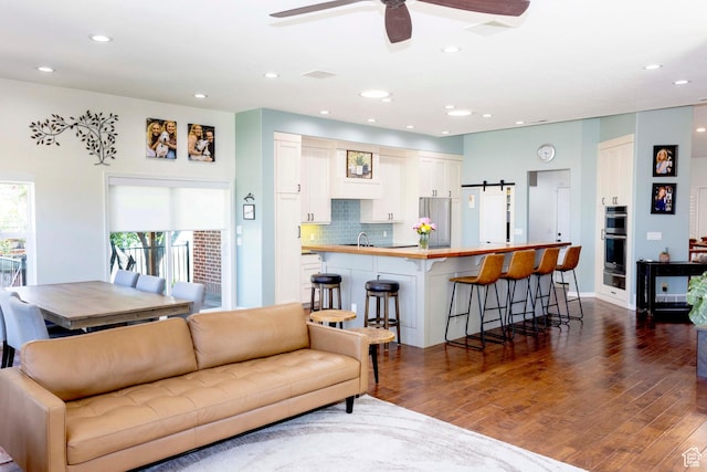 964 W Vahe St, Draper, UT 84020 - living area with ceiling fan, dark wood finished floors, and recessed lighting