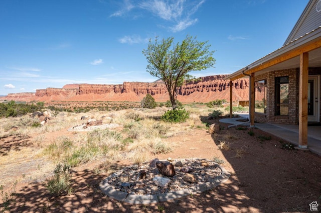 397 N Wendy Dr, Torrey, UT 84775 - view of yard with a patio and a fire pit