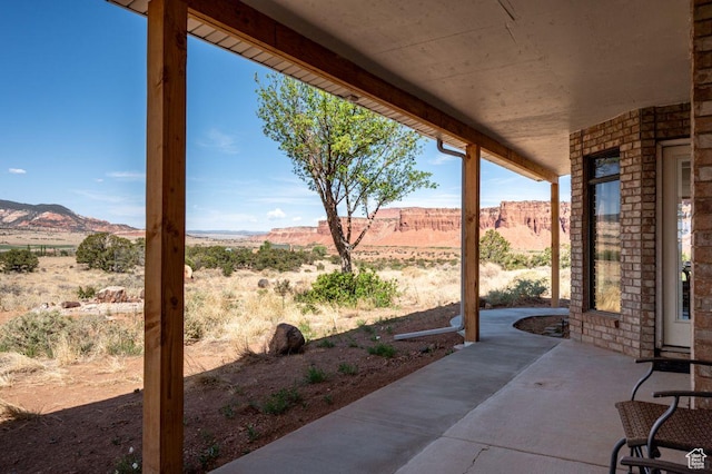 397 N Wendy Dr, Torrey, UT 84775 - view of patio featuring a mountain view