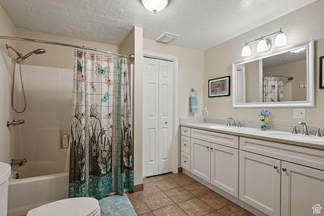 397 N Wendy Dr, Torrey, UT 84775 - bathroom with double vanity, toilet, shower / bath combination with curtain, a textured ceiling, and a closet