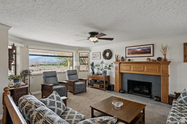 397 N Wendy Dr, Torrey, UT 84775 - living room featuring light carpet, ceiling fan, crown molding, and a fireplace