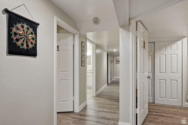 397 N Wendy Dr, Torrey, UT 84775 - hall featuring wood finished floors, baseboards, and a textured wall