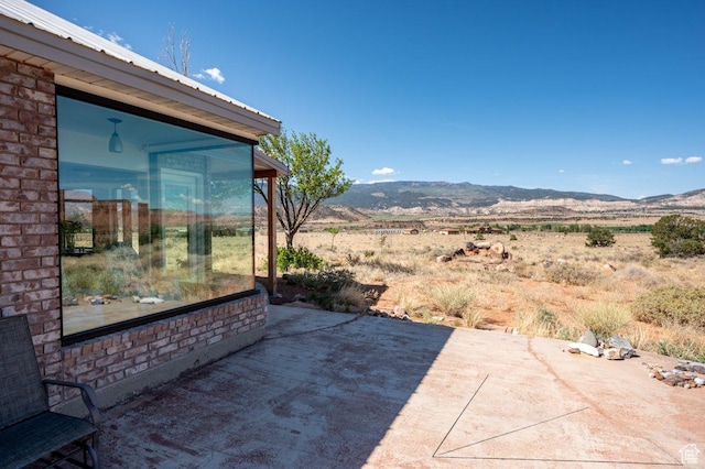 397 N Wendy Dr, Torrey, UT 84775 - view of patio with a mountain view