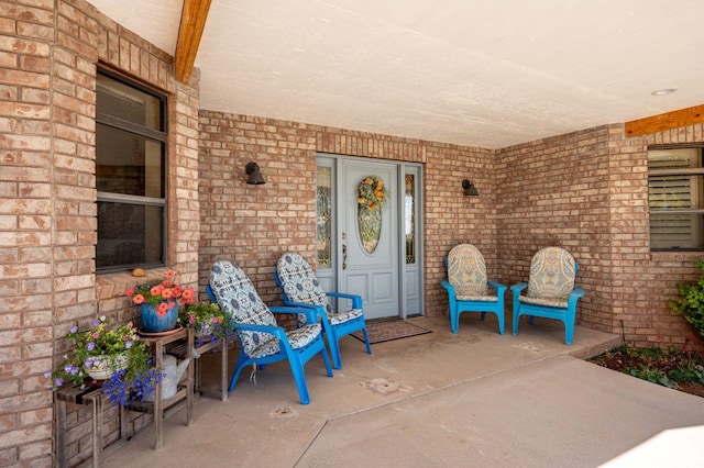 397 N Wendy Dr, Torrey, UT 84775 - property entrance featuring brick siding and covered porch