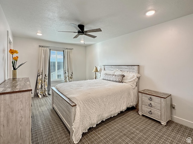 290 E 1825 N Unit 58, North Ogden, UT 84414 - bedroom featuring dark carpet, baseboards, a textured ceiling, a ceiling fan, and recessed lighting